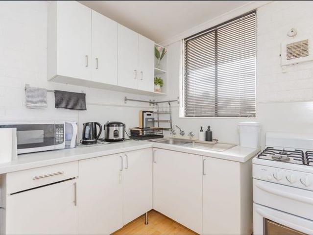 Convenient Riverside Living in a Secure Complex