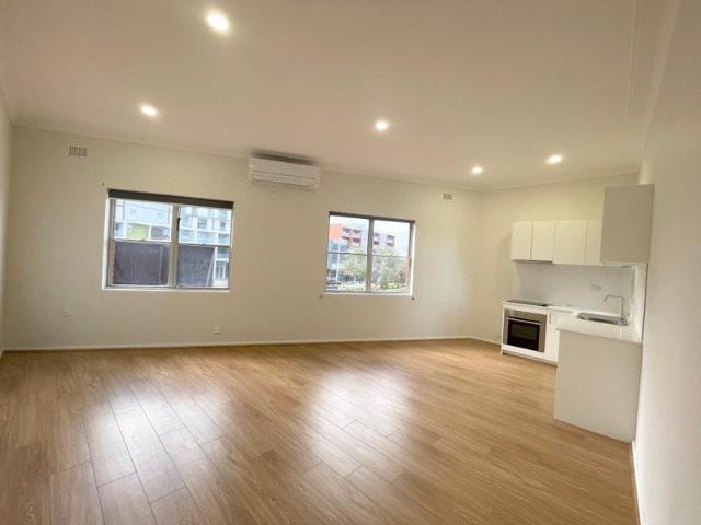 Convenient Two Bedroom Unit with Rear Lane Access
