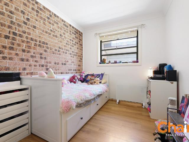 Convenient 4 bedroom townhouse at the rear of peaceful complex