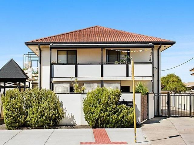Conveniently Located With Only Steps to the Beach