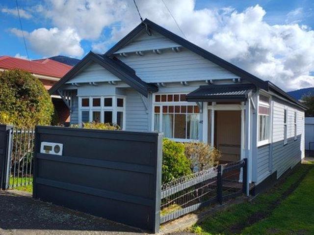 Conveniently Located Character Cottage