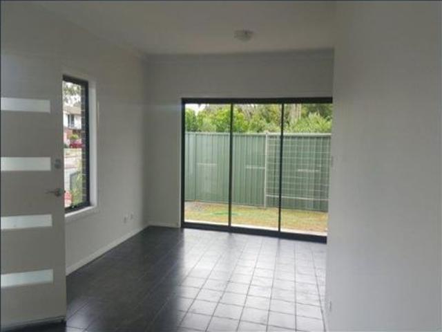CONVENIENTLY LOCATED MODERN TOWNHOUSE