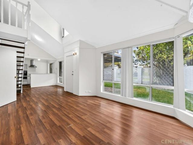 CONVENIENTLY SITUATED TWO BEDROOM TOWNHOUSE WITH LOFT