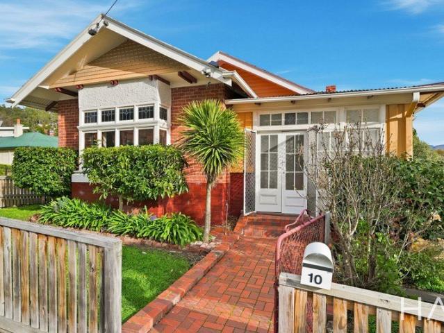 Convenience Personified. Brick Character Home. Exceptional Location!