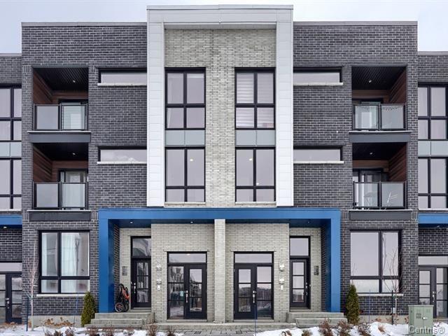 CONDO DERNIER ÉTAGE 2 STATIONNEMENTS INT