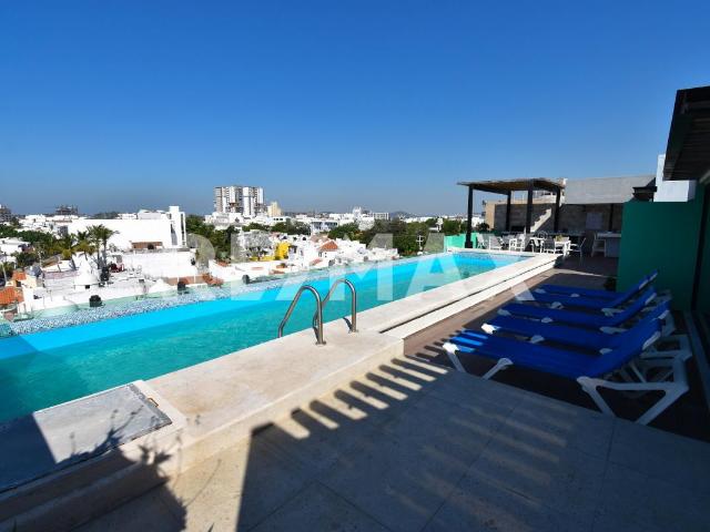 Condominio de Lujo de 2 Recamaras en Zona Dorada