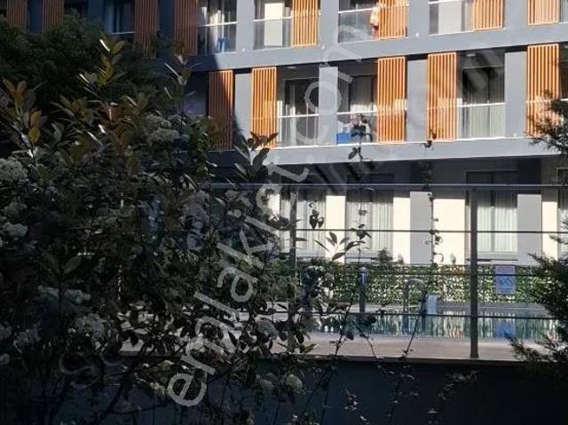 Coordinate Suits'de Bornova'da Eşyalı 1+0 Kiralık Daire