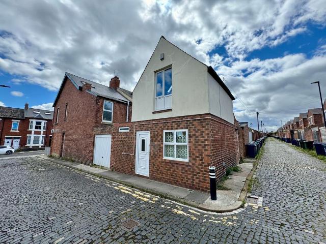 Coach house for sale