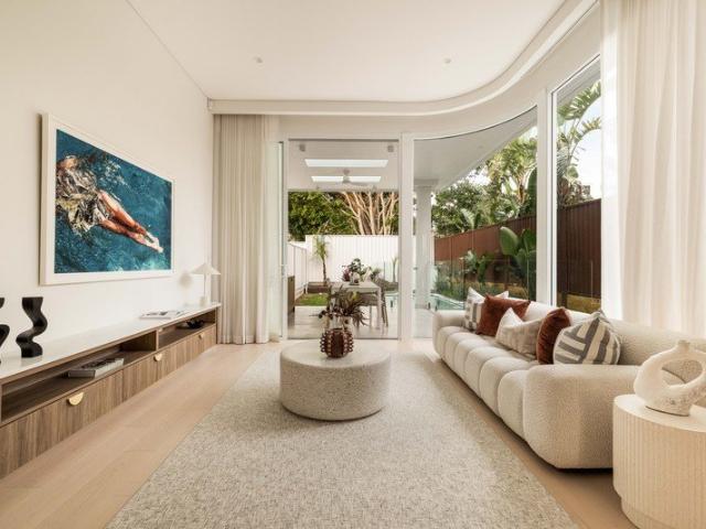 Coastal Masterpiece with 6 Car Basement and Lift