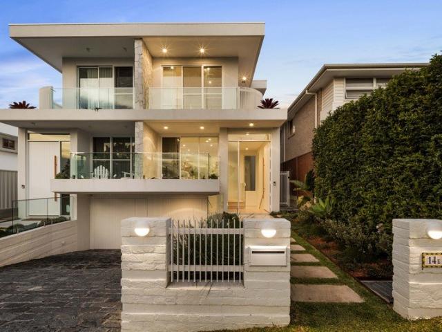 Coastal Masterpiece with 6 Car Basement and Lift