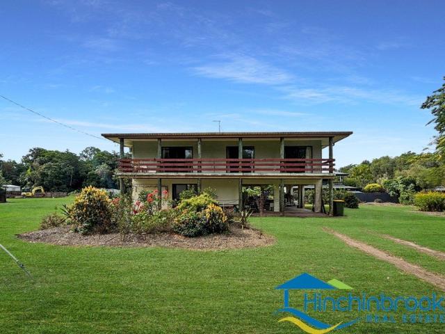 Coastal Opportunity Opposite the Golf Course Renovate, Invest or Make It Your Own