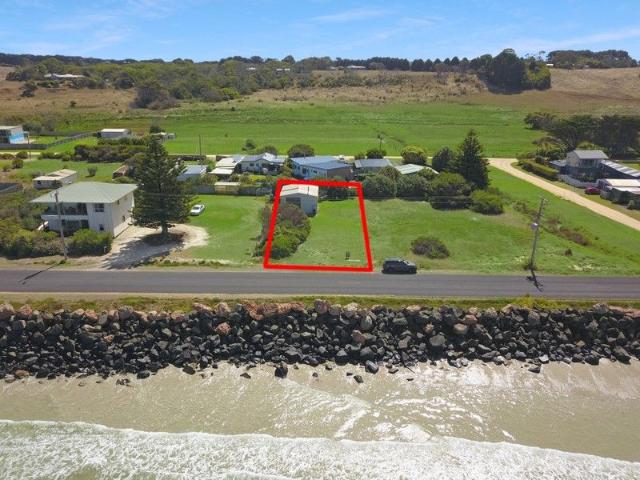 Coastal Opportunity: Waterfront Proximity with Shedding