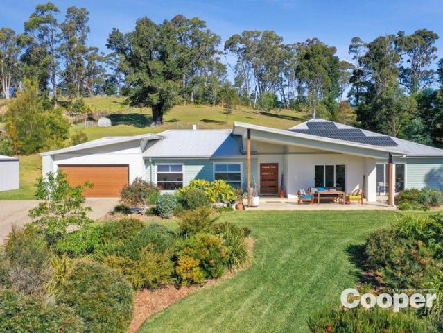 Coastal Acreage Living with Lake Views & Endless Lifestyle Appeal