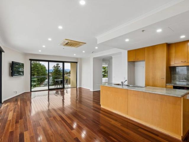 Coastal Apartment Living with Marina and City Views in Glenelg