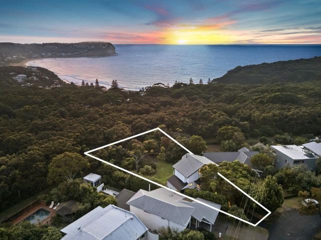 Rare north facing 1258sqm level block with beach track access from the rear gate
