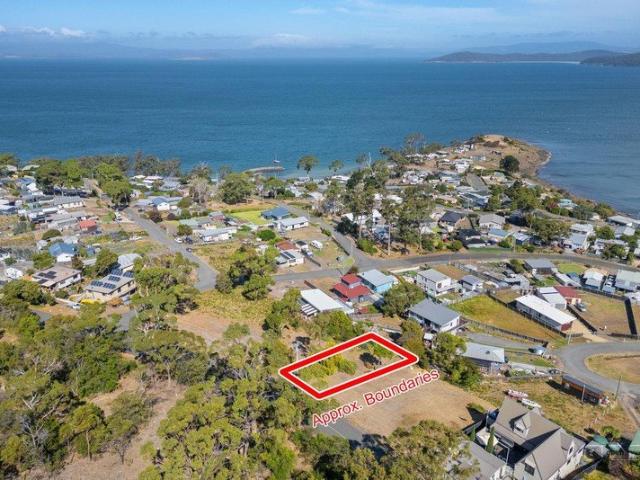 Coastal Bliss Awaits Build Your Dream Home with Stunning Bay Views!