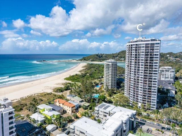 Coastal charm meets prime convenience with direct beach access