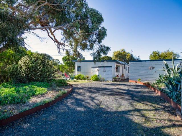 Charming Coastal Retreat in a Prime First Estate Location