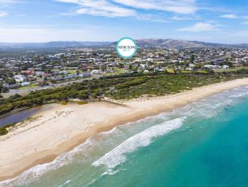 Coastal Charm, Renovated Comfort & Stunning Ocean Views!