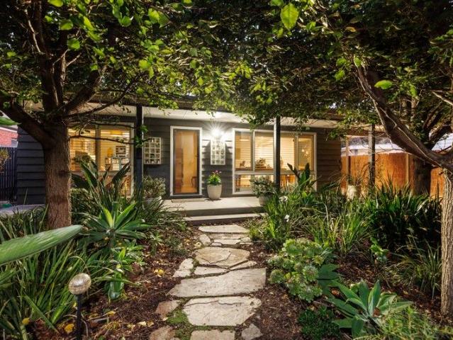 Coastal Charm Surrounded By Established Gardens