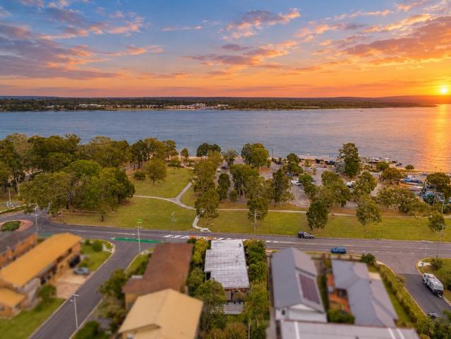 COASTAL CHARM, WATER VIEWS & A LIFESTYLE TO LOVE!