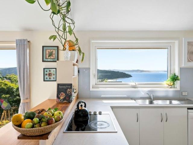 Coastal Charm with Breathtaking Views and Endless Potential