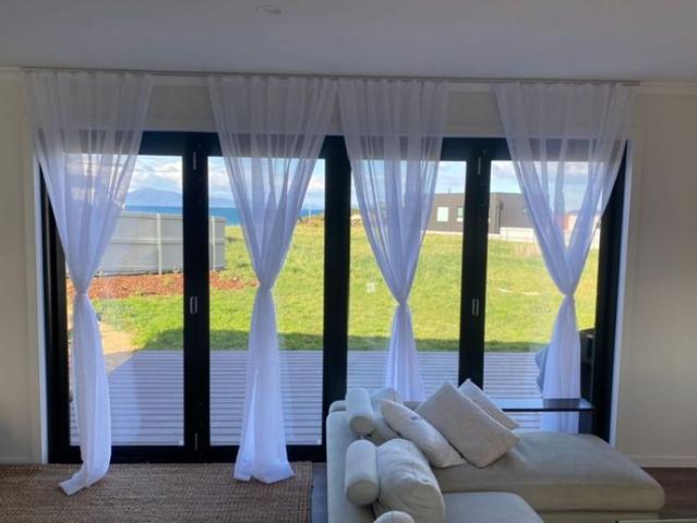 Coastal Charm with Stunning Water Views – Tranquil Living in Swansea