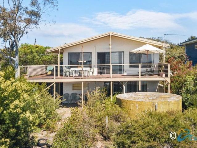 COASTAL CHARM WITH PANORAMIC WATER VIEWS
