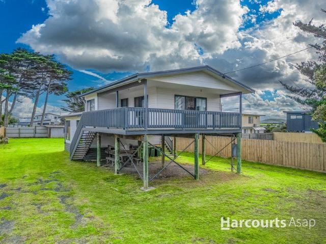 Coastal Charm with Water Glimpses & Exciting Subdivision Potential STCA
