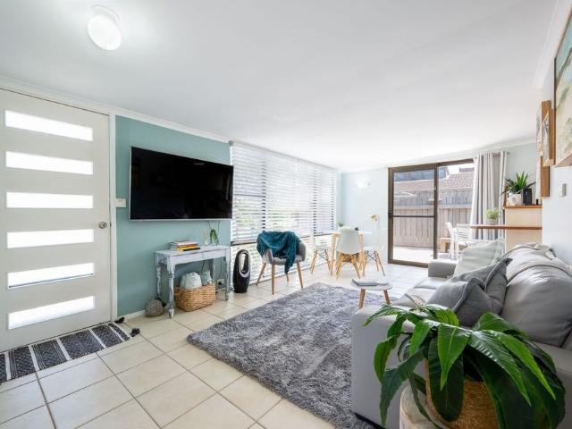 Coastal Charming Unit with Utilities Included!