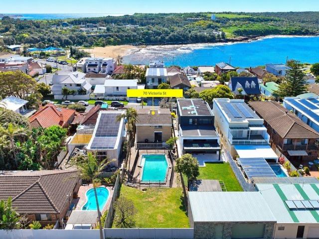 Coastal Classic with Dual Street Frontages & DA Approved Plans for a Luxury Beachside Masterpiece