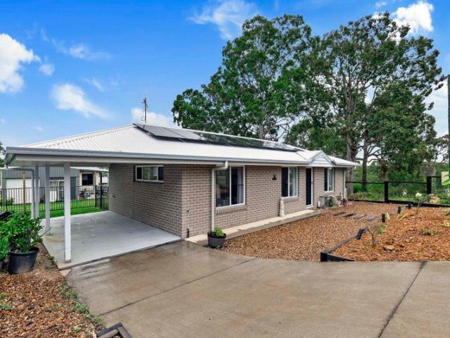 Coastal Comfort & Low Maintenance Living in Peaceful River Heads