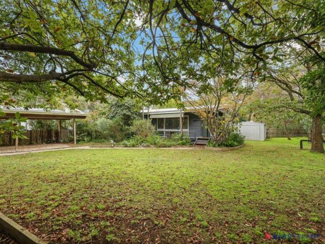Coastal Comfort with Easy Care Living Garden Maintenance and Garage included