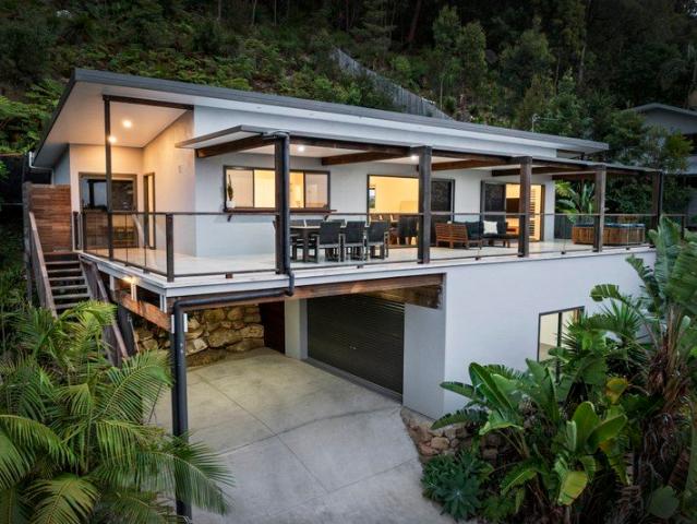 Coastal contemporary home moments to beach
