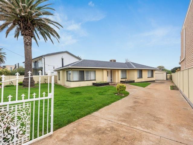 Coastal Convenience and Low Maintenance Living