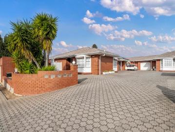 Coastal Convenience in a Private Group with Rare Double Garage