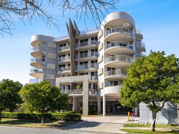 Coastal Elegance Meets Effortless Living with dual balconies in prime Locale!