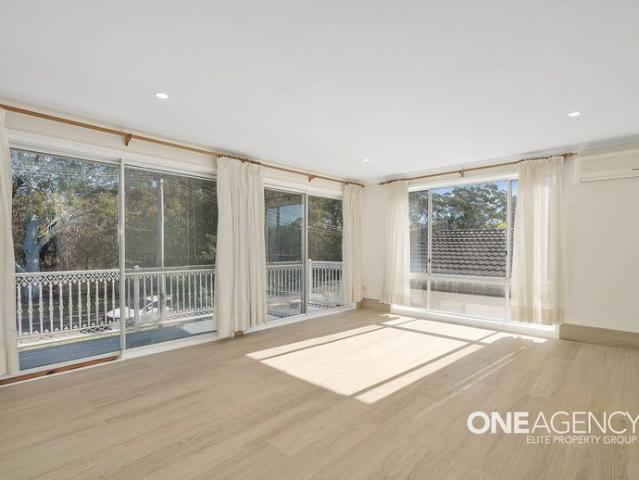 COASTAL ELEGANCE AND MODERN COMFORT JUST MOMENTS FROM THE BEACH