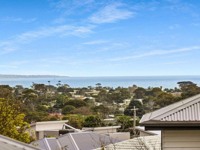 Coastal Elegance with Bay Views