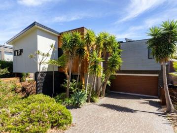 COASTAL ELEGANCE WITH EXCELLENT FLOORPLAN