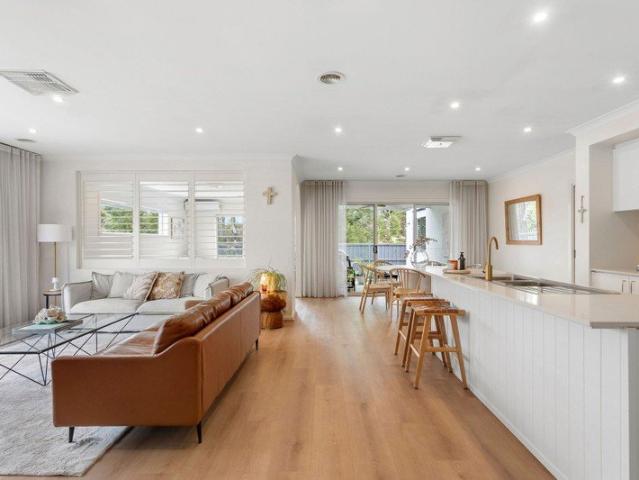 COASTAL FAMILY LIVING WITH A GOLF COURSE BACKDROP
