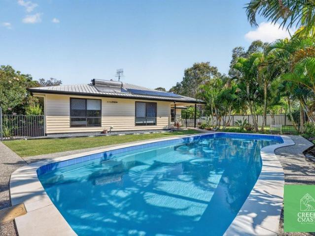 Coastal Home on Half An Acre, Huge Shed, Pool & Prime Corner Exposure!