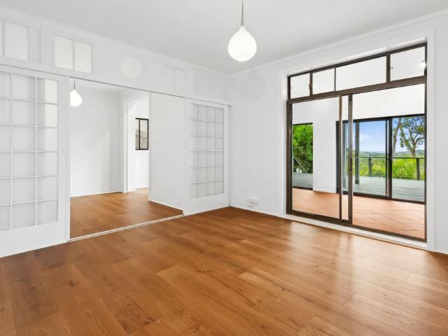 Coastal Inspired Lower Duplex Home with Ocean Views and Exceptional Entertaining Space