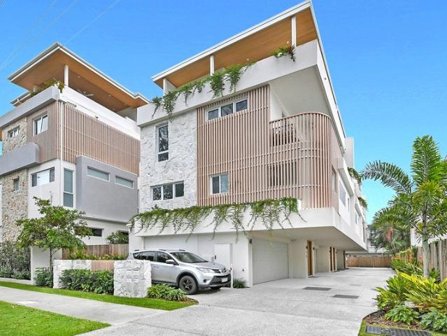 Coastal Luxury with Ocean Views and Rooftop Entertaining