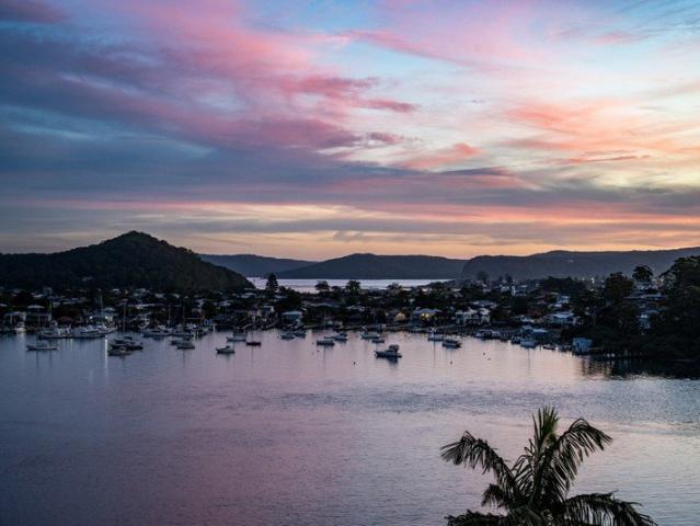 Coastal Luxury with Stunning Panoramic Water Views