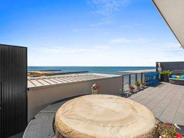 Coastal Luxury with Uninterrupted Bay & City Views