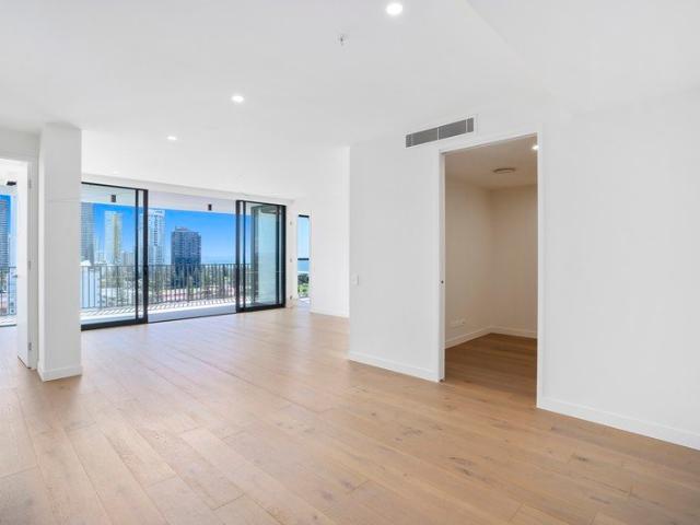 Coastal luxury in thriving Mermaid Beach! 2 bedroom + multi purpose room!