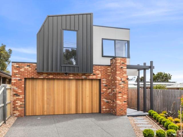 Coastal Luxury Steps from the Bay