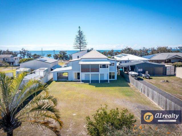 Coastal Living with Space, Flexibility & Ocean Glimpses