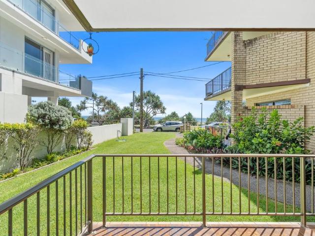 Coastal Living at its Finest Ground Floor Beachside Apartment